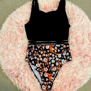 One piece swimsuit. Never wore.